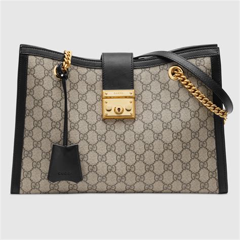 sacoche gucci gg black|GG Supreme Padlock Medium Shoulder Bag With Black Details.